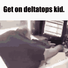 a picture of a person sitting in front of a computer with the caption get on deltatops kid