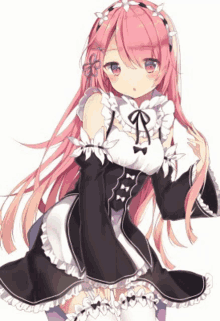 a girl with long pink hair is wearing a black and white dress and knee high socks .