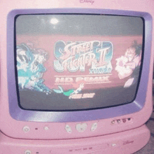 a pink and purple disney tv with a street fighter game on the screen