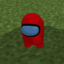 a red among us character with a blue face is standing in the grass