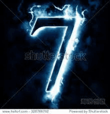 the number seven is lit up in blue flames on a black background