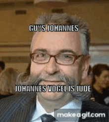 a man with glasses and a mustache says guys johannes johannes vogel is jude .