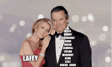 a woman in a red dress is hugging a man in a tuxedo with the name laffy written on the bottom