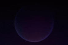 a purple circle in the middle of a dark background