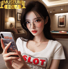 a woman wearing glasses and a shirt that says slot is looking at her phone