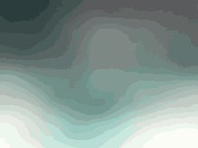 a blurred image of a green and white background with a gradient .