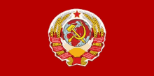 a coat of arms with a hammer and sickle and a star on a red background