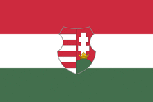 a red white and green flag with a shield in the middle