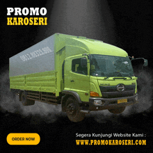 a green hino truck with the website www.promokaroseri.com on the bottom