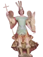 a statue of a man with wings and a cross on his head