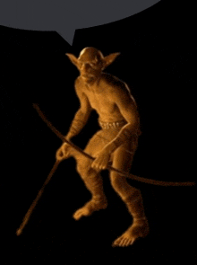 a gold statue of a man with a bow and arrow