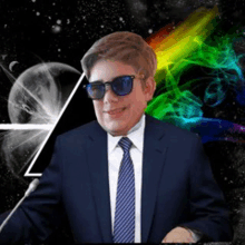 a man in a suit and tie wearing sunglasses stands in front of a colorful background