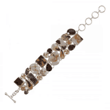 a bracelet with a toggle clasp and various stones on it