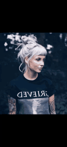 a woman wearing a t-shirt that says develed