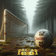 a soccer ball that says ' sbobet ' on it in front of a goal