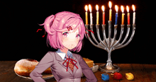 a pink haired anime girl stands in front of a menorah