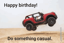 a red jeep is flying through the air with the words happy birthday do something casual