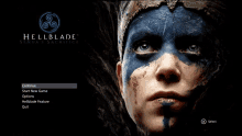 a video game called hellblade shows a woman with blue and white paint on her face