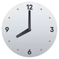 a clock shows that it is almost 5:00