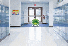 a hallway with lockers and a sign that says welcome on it