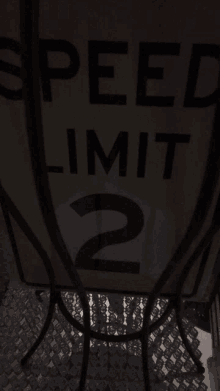 a speed limit sign that says speed limit 2 on it