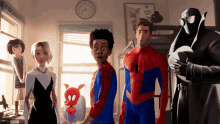 a group of spider-man characters are standing in a bedroom