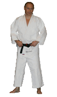 a man wearing a white karate uniform with vladimir putin embroidered on his chest