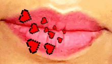 a close up of a woman 's lips with red hearts coming out of them