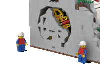 two lego figures are standing next to each other in front of a wall