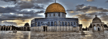 the dome of the rock is a large building with a dome