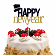 a cake with cherry frosting and a happy new year cake topper