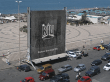 a large billboard with the letters ku on it