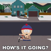 stan marsh from south park is riding a bike in front of a house