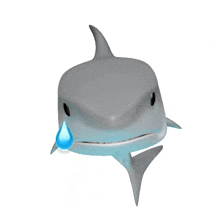 a shark is crying with a tear in its mouth .