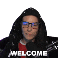 a woman wearing glasses and a black hood says welcome