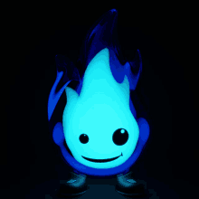 a glowing blue flame with a face and feet