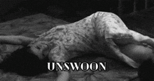 a black and white photo of a woman laying on a bed with the word unswoon written on the bottom