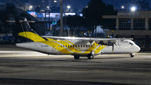 a ps-vpb airplane is parked on the tarmac at night