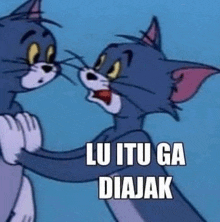 a cartoon of tom and jerry hugging each other with the caption `` lu itu ga diajak '' .