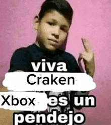 a young boy giving the middle finger with the words viva craken xbox es un pendejo written on the bottom