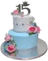 a blue and white cake with pink flowers and the number 15 on top