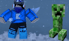 a minecraft character wearing a blue hoodie with k on it