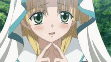 a close up of a cute anime girl with green eyes and a white veil .