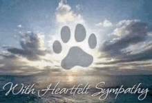 a picture of a paw print in the sky with the words `` with heartfelt sympathy '' below it .