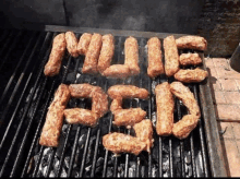 a grill with a bunch of meat that says ' mule bed '