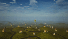 a man in a yellow suit is flying over a landscape with houses