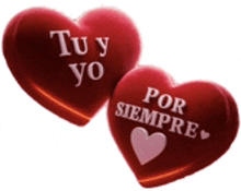 two red hearts with the words tu y yo por siempre written on them