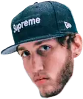 a man wearing a supreme hat looks at the camera