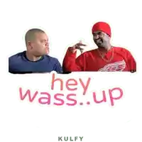 two men are standing next to a sign that says hey wass.up