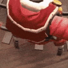 a pixelated image of a person dressed as santa